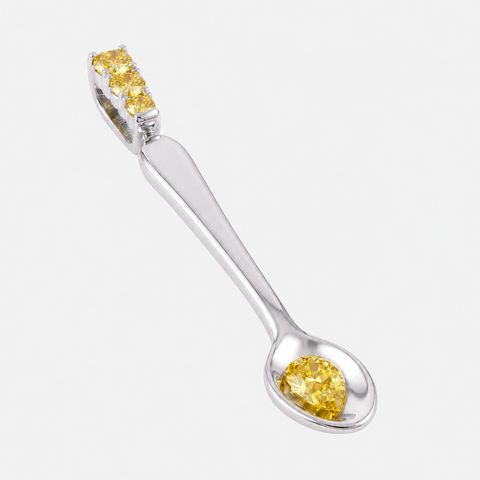 Yellow Sapphire spoon pendant in 9ct white gold, angled view