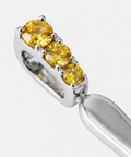 Three round yellow sapphires claw set into the bail