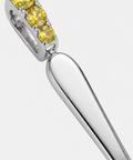 Bail and handle detail on the yellow sapphire spoon pendant