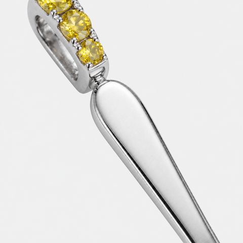Bail and handle detail on the yellow sapphire spoon pendant