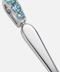 Bail and handle detail on the blue topaz spoon pendant