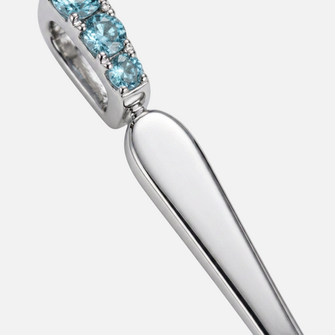 Bail and handle detail on the blue topaz spoon pendant