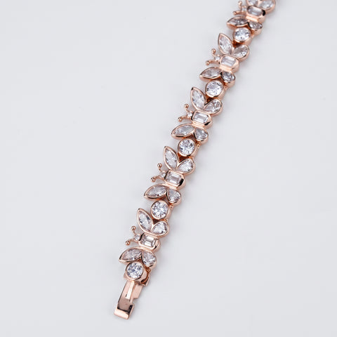 Diamond butterfly bracelet in 9ct rose gold, full length flat lay