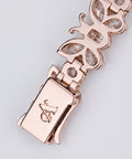 Butterfly link and clasp macro detail with engraved A Jewellers monogram