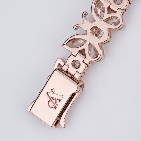 Butterfly link and clasp macro detail with engraved A Jewellers monogram