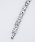 Diamond butterfly bracelet in 9ct white gold, full length flat lay