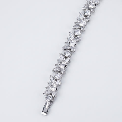 Diamond butterfly bracelet in 9ct white gold, full length flat lay