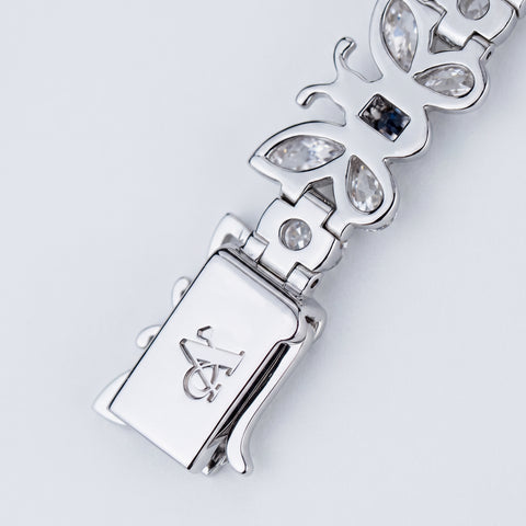 Butterfly link and clasp macro detail with engraved A Jewellers monogram