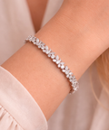 Diamond butterfly bracelet in 9ct white gold worn on model