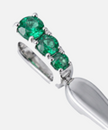 Three round emeralds claw set into the bail