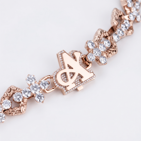 Rose gold cross chain clasp set with diamonds, with the A Jewellers logo
