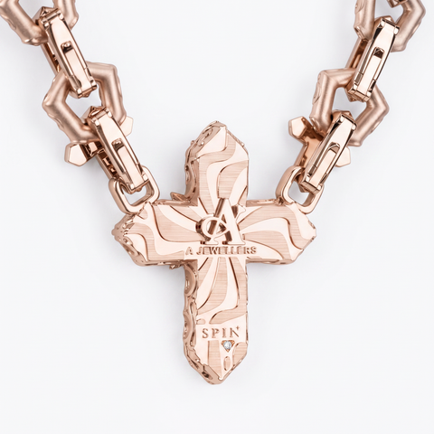 Reverse of the rose gold cross pendant, engraved A Jewellers and Spinola