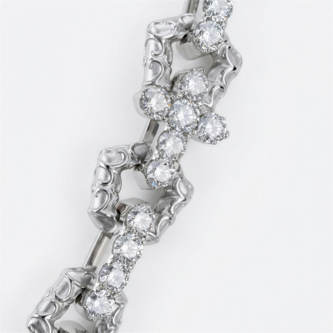 Diamond set cross link chain detail in 9ct white gold