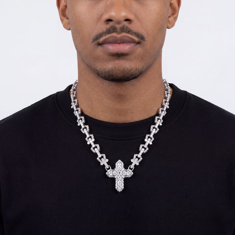 Diamond cross chain necklace in 9ct white gold worn on model