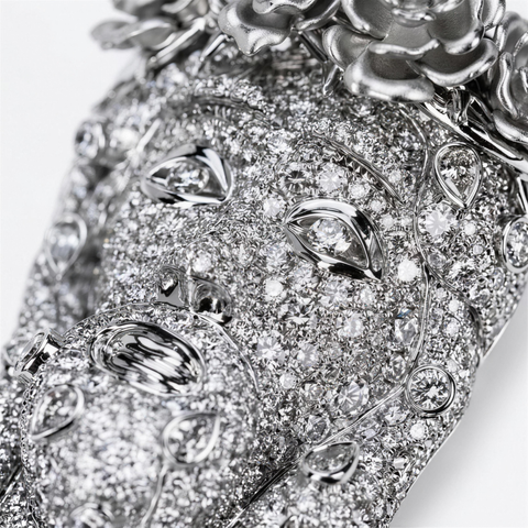 Pave set face detail with round and pear cut diamonds