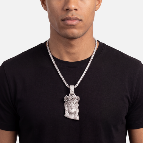 Diamond Jesus piece pendant in 9ct white gold worn on a diamond tennis chain