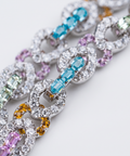 Macro detail of the gemstone set chain links in 9ct white gold