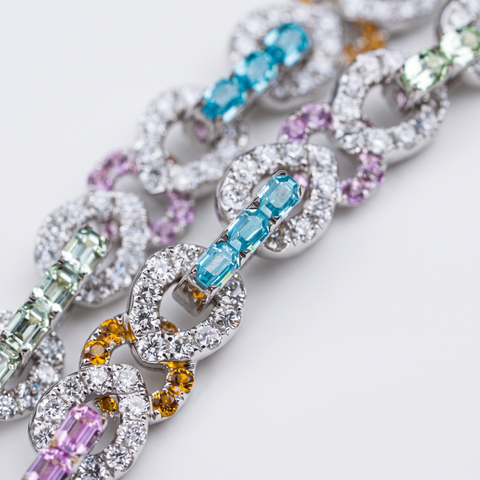 Macro detail of the gemstone set chain links in 9ct white gold
