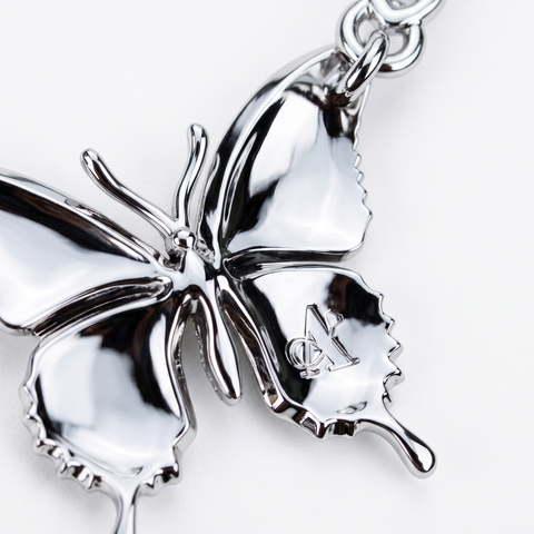 Reverse of the butterfly pendant in 9ct white gold, angled view